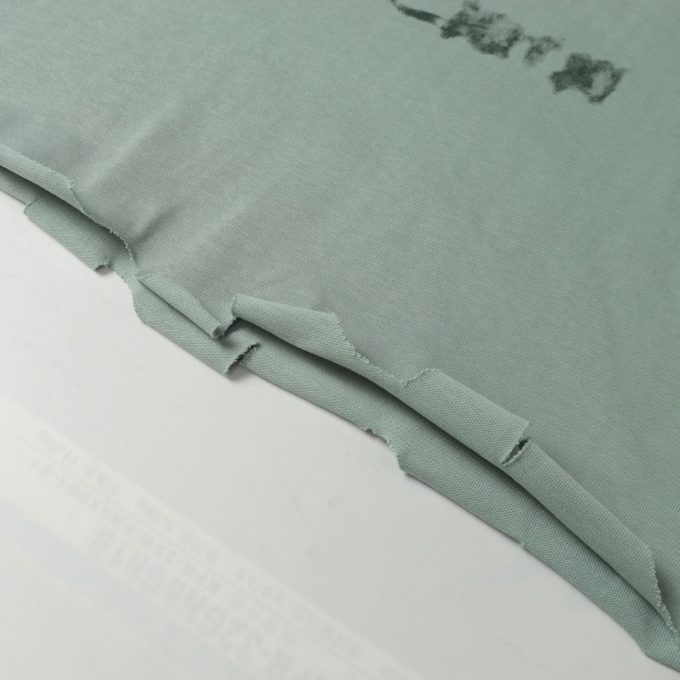 Balenciaga's white ink graffiti short-sleeved shirt is worn out