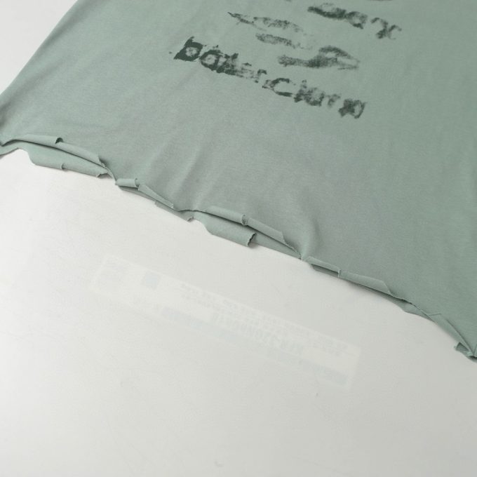 Balenciaga's white ink graffiti short-sleeved shirt is worn out