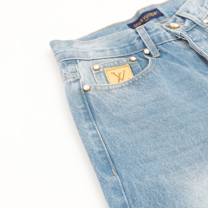 LV embroidered pocket denim blue denim trousers