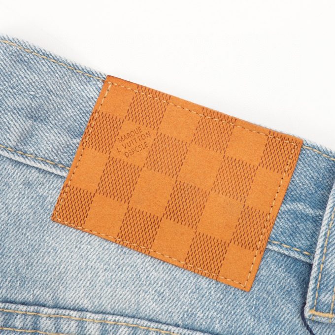 LV embroidered pocket denim blue denim trousers