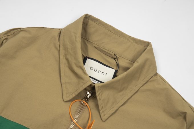 A Gucci red and green patchwork jacket on the chest