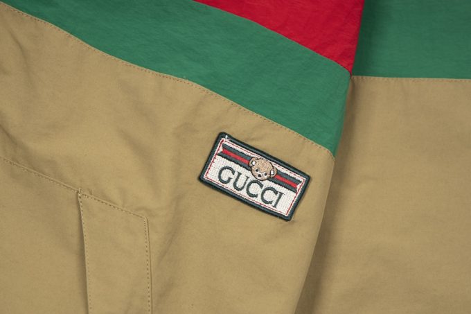 A Gucci red and green patchwork jacket on the chest