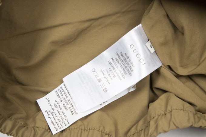 A Gucci red and green patchwork jacket on the chest