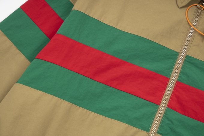 A Gucci red and green patchwork jacket on the chest