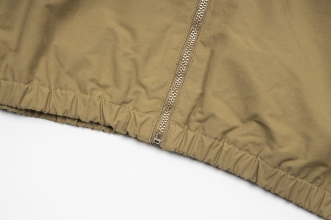 A Gucci red and green patchwork jacket on the chest