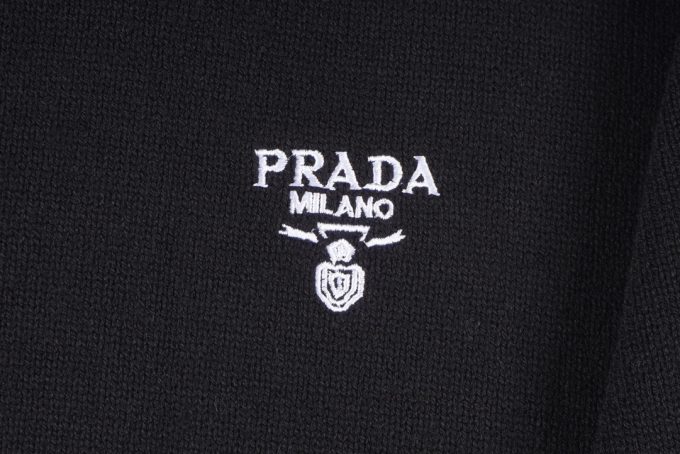 Prada's exclusive triangular logo design for a wool sweater